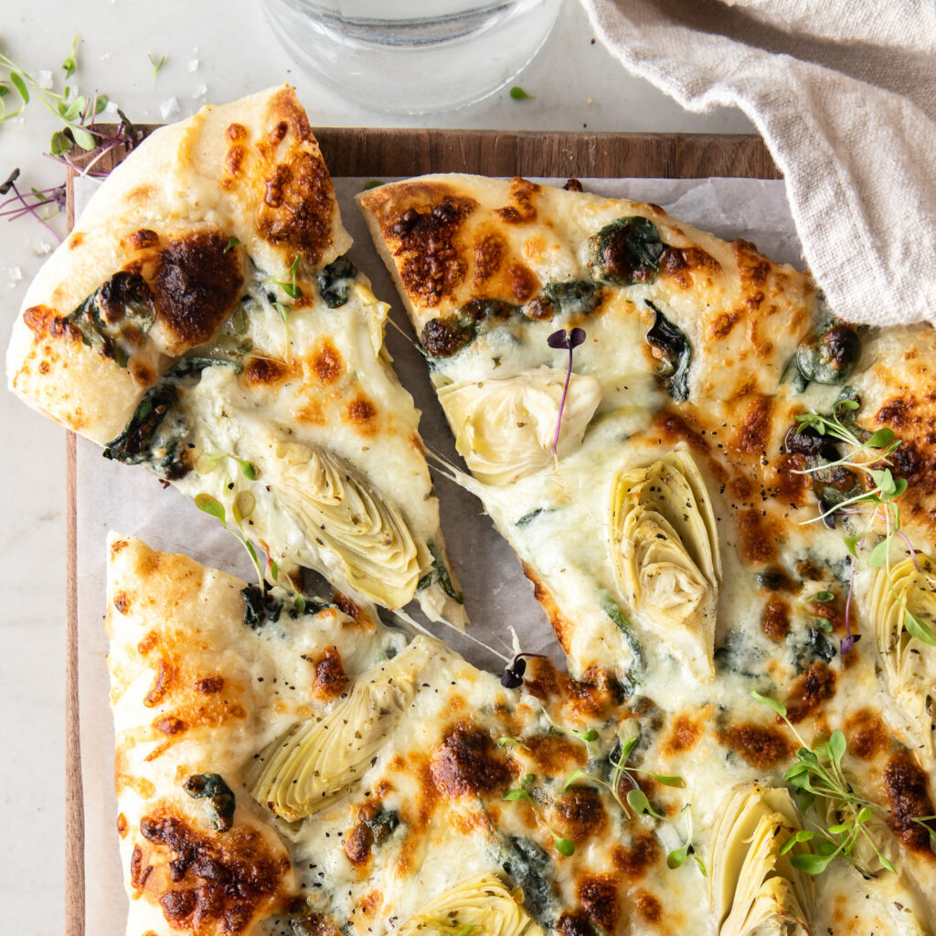 Artichoke Pizza With Spinach Parmesan Cream Sauce With Spice