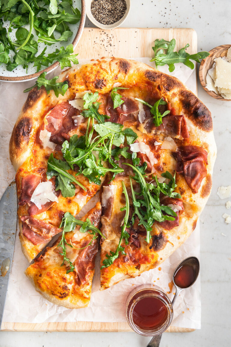 prosciutto pizza with arugula | With Spice