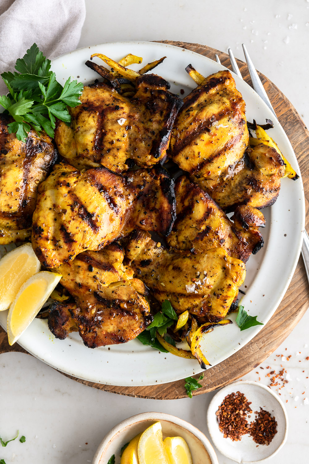 https://www.withspice.com/wp-content/uploads/2023/01/grilled-turmeric-chicken-thighs.jpg