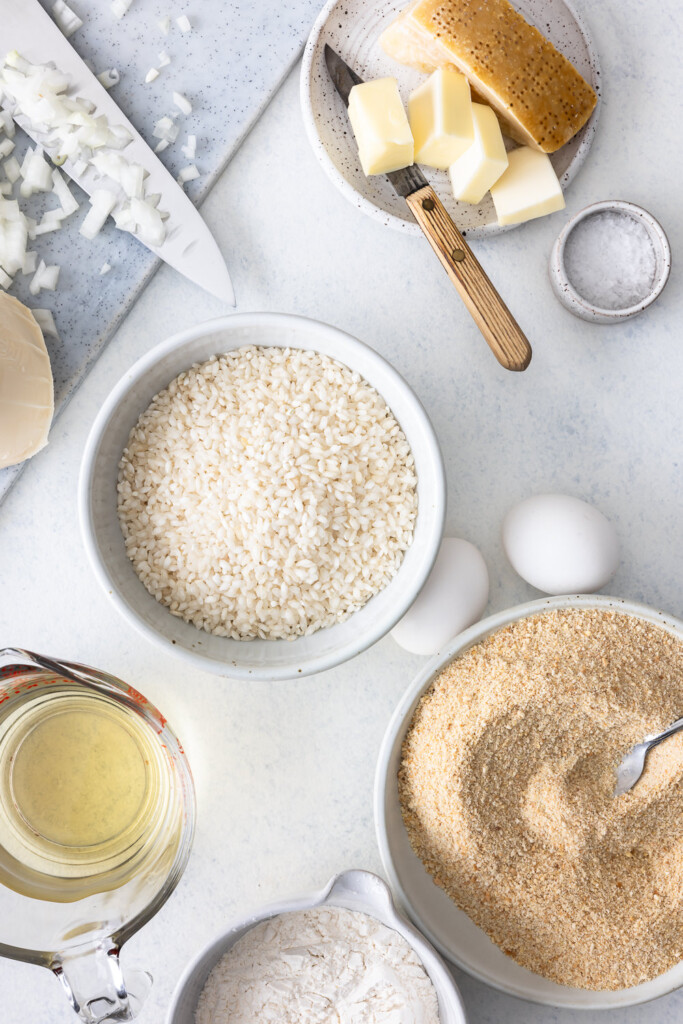 ingredients_risotto rice, butter, white wine, bread crumbs, mozzarella, onion, stock, parmesan